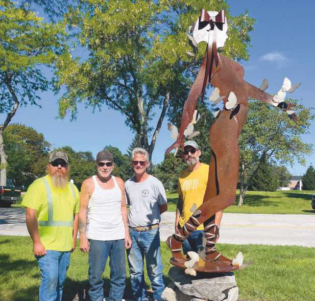 Installation team members preparing the new exhibit include, from left: Jeremy Hurst, operator; Mike Sohikian, installation director; Jim Taylor, installer and Richard Maurer, installer. The team is standing by Mike Sohikian’s sculpture, Nymph of Artemis.