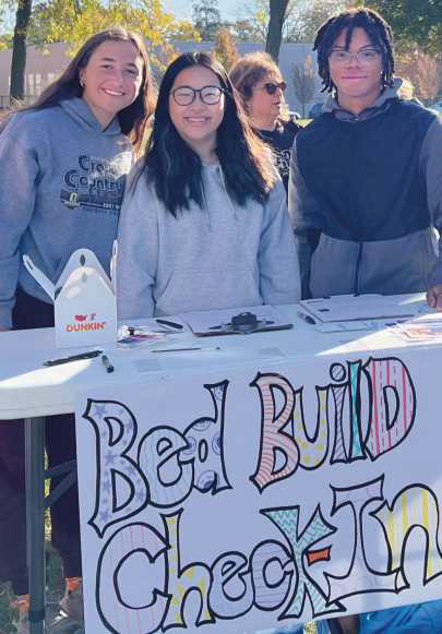PHS Interact students helped build beds in last year’s Build Beds service project.