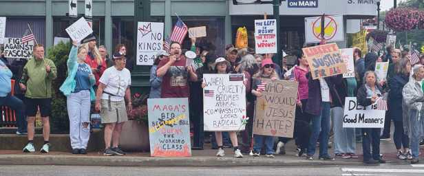 Protesters gathered at the corner of Wooster and Main streets.