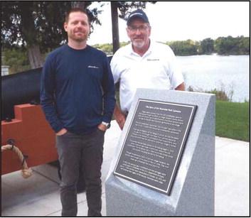 On September 18, a new podium and historical plaque were placed for the Riverside Park cannons. A formal dedication will take place at a future date. Perrysburg City workers Brody Walters and Greg Kuhr are pictured above.