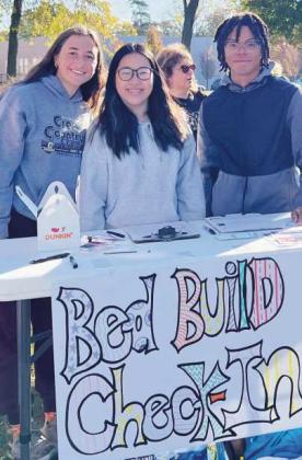 Perrysburg High School Interact students helped build beds in last year’s Build Beds service project.