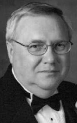 JAMES E. PODIAK