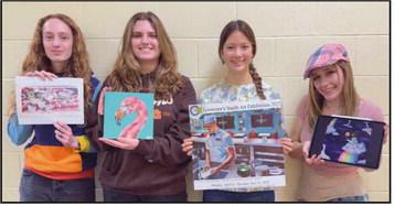 Madison Fisher, Sienna Momberg, Iris Weinstein and Gia Soto with their artwork.