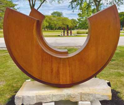 “Inverted Arch #6” by Ken Thompson earned first place honors at the Perrysburg Sculpture Walk at Woodlands Park.