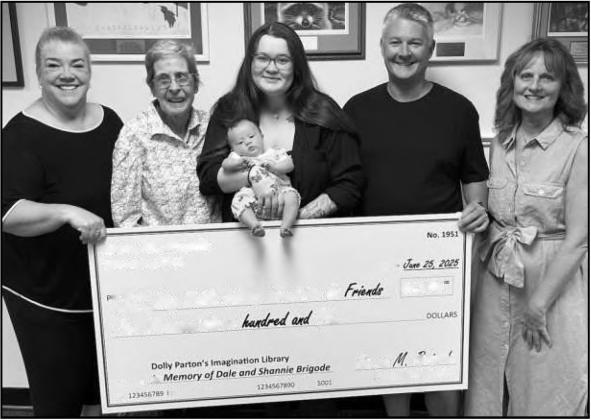 From left: Sandy Snyder, Chair of the WPLFF; Karen Brigode; Karen’s great-niece, Elizabeth, with her great-great-niece, Iris Brigode; Karen’s nephew, Nicholas Brigode; and Lisa Richard, from the WPLFF.