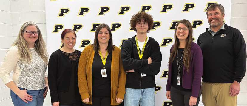 From left: Denise Phillips, board of education member; Christine Albright, director of careers and community service for Perrysburg Schools; Analisa Williams, PHS college and career readiness instructor; Lucas Caris; Rachel Zickar, director of communications for Perrysburg Schools, and Jeff Abke, director of development and alumni relations for Perrysburg Schools.