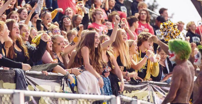 Perrysburg High School’s fan section cheered on the Yellow Jackets for the final NLL contest against their cross-river rival Maumee.