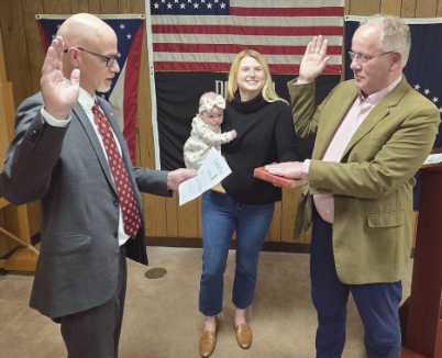 From left: Wood County Prosecuting Attorney Paul Dobson, Lucy Hartkopf, Perry Mack Hartkopf and re-elected Trustee Robert Mack.
