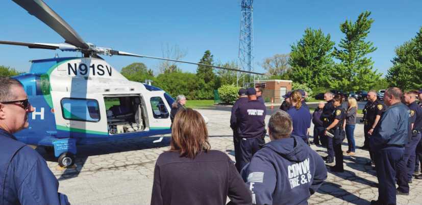 Pilot Meghan Newyear instructs first responders on helicopter landing zone safety.