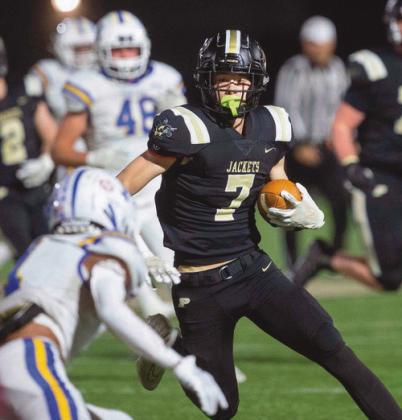 Wide receiver Andrew Hunt attempts to thwart a Findlay defensive back.