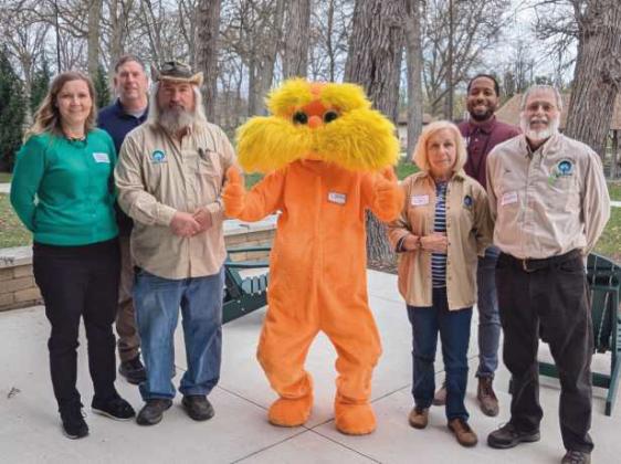 From left, back row: City Urban Forester Dan Ledyard and City Planning and Zoning Deputy Administrator Mark Easterling. Front row: Street Tree Commission members Kali Sawaya and Scott Kirby, the Lorax and Street Tree Commission members Christine Ardley and Jim Hagen.