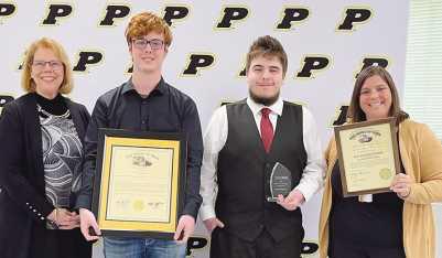 From left: Board member Sue Larimer, Colten Ruemmele, Jackson Kicinski and PHS College and Career Readiness Instructor Analisa Williams. Not pictured: Cheyenne Irwin, Aaron Linkes and Marwa Sediqe.