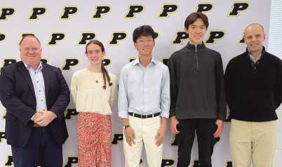 Left to right: Board of Education Vice President Eric Benington, salutatorian Laura Valette, valedictorian and national merit finalist Patrick Chen, national merit finalist Anthony Clark and PHS Interim Principal Dave Dakolios. Not pictured: National merit finalists Nicholas Walton and Jacob Xiao.