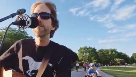 Local musician Slim performs at the Slow Roll.