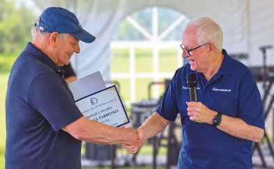 Mayor Weber presented the Mayor’s Award to George Farbotko, creator of “Observer.”