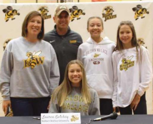 Lauren Getchey will play lacrosse for Baldwin Wallace University, where she plans to major in psychology. With her are her parents Kristin and John and her sisters Natalie and Leah.