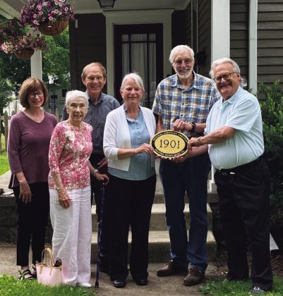 Historic Perrysburg Inc. distributed a plaque recently at 338 East Second Street. Homeowners are Bob and Marcia Reynolds. Historic Perrysburg Inc. members pictured with the homeowners are Joanie Graver, Richard Baranowski, Mary Merrick and Dave Kleeberger. Historic Perrysburg distributes the plaques to home owners with a home that is 100 years or older. The application can be found at historicper-See rysburg.org. There is a small processing fee associated with the plaque.