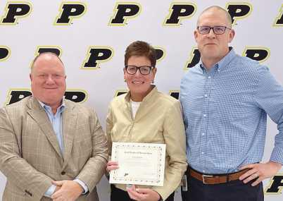 From left, Board of Education Vice President Eric Benington, Chris Harper and Justin Fults.