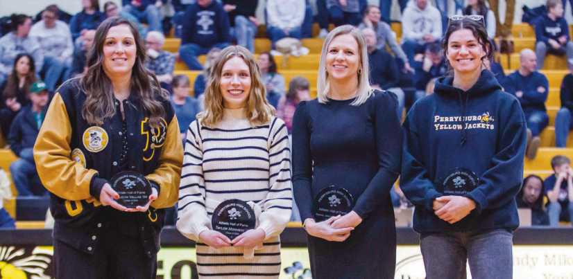 Above, former PHS athletes with plaques at Hall of Fame induction ceremony, from left, are Allison Vallas, Taylor Monheim, Rachel Mathews Heath and Courtney Clody.