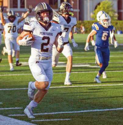 Runningback Connor Walendzak, eludes Trojan players, scooting down the sideline for six.