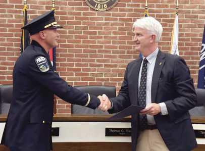 From left, Chief Sargent with Mayor Tom Mackin.