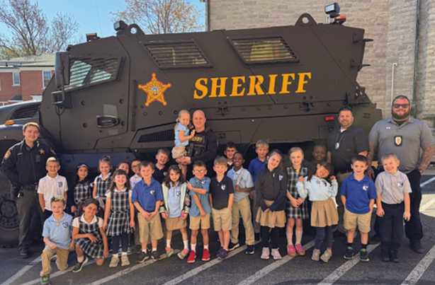 The Wood County Sheriff's SWAT truck and SWAT officers recently visited the Saint Rose kindergarten. Students learned about law enforcement and were able to tour the inside of the SWAT truck.