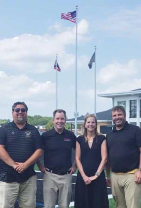 From left: Perrysburg High School Athletic Director Chuck Jaco, Perrysburg Automall President Richard Cronin, Perrysburg Automall Controller Connie Cronin and Perrysburg Schools Director of Development Jeff Abke.