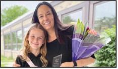 Award winner Brandi Menchhofer, right, with student, Kennedy, who nominated her.