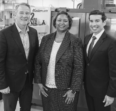 U.S. Senator Jon Husted, Owens President Dr. Dione Somerville and acting U.S. Secretary of Labor Keith Sonderling.