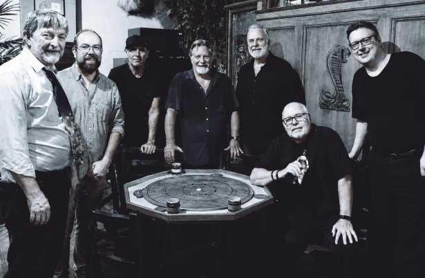 Band members are, from left, Tim Tiderman, John Grafing, Pat McDonagh, Dave Stella, Bernie Greenberg, Chuck Caswell and Bob Hoff. Not pictured: Bob Manley.