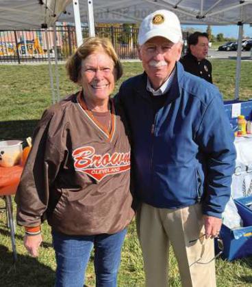 Jackie Venzel, Country Garden Club member, explains the food composting program with Richard Sipp, Perrysburg Rotary Community Foundation Board of Trustees chair, at the Perrysburg Rotary Club’s 2025 Fall Into Rotary Park Event.