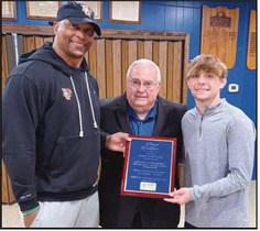 From left: Coach Eddie George, Freedom Township Men’s Club Representative Rick LaLonde and Marcus Blaze.