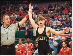 Marcus Blaze as a junior at PHS, capturing his third state title.
