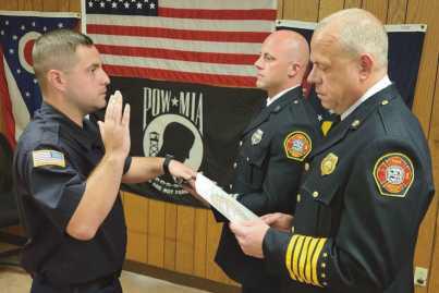 From left: New Firefighter/EMT Drew Lasley, Captain Michael Hampton III and Fire Chief Tom Brice.