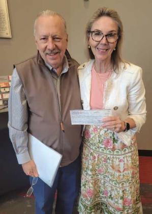 Jack Sculfort, Perrysburg Rotary Community Foundation executive director, presents a $10,000 Signature Sponsor check for America 250 to Joy Studer, Historic Perrysburg, Inc. board president.