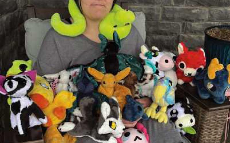 Gracie Wellington with a few of her stuffed animals.