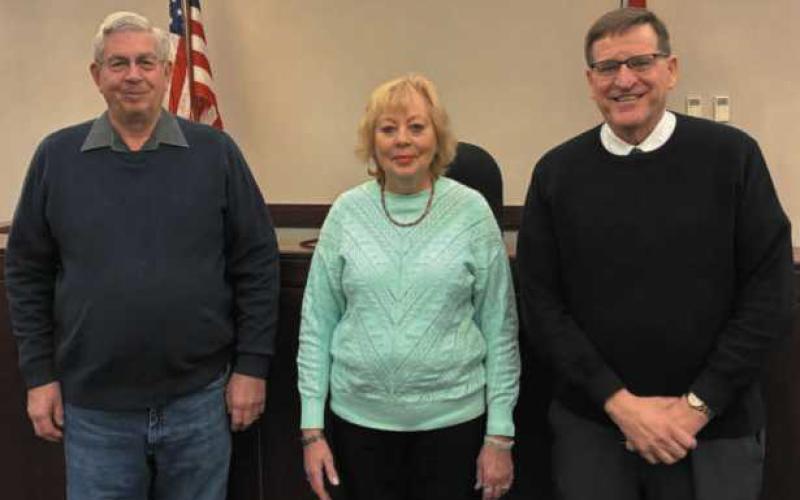 Oath of office on February 6 at Wood County Juvenile Court (from left): CRB volunteers Steve Heckler and Ann Hannah-Cizauskas with Judge David Woessner.