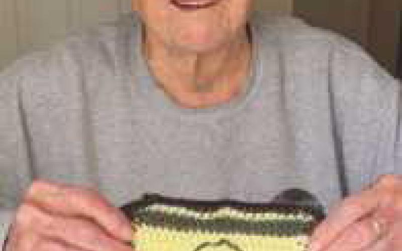 Denny Barrett, a Perrysburg resident, displays his square.