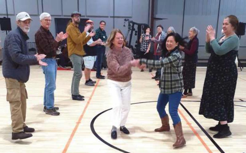 Walking the walk in the contra dance.