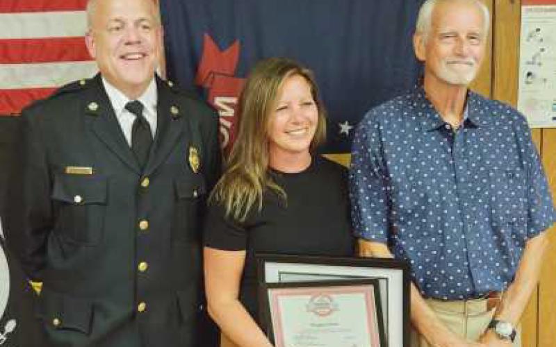 From left: Fire Chief Tom Brice, hero awardee Maggie Sutton and survivor Klaus Zoepke.