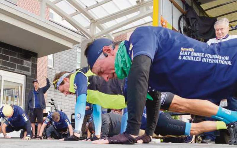 Before beginning each day’s trip, the U.S. Naval Academy Class of 1983 graduates perform 22 pushups, symbolizing the number of veterans who commit suicide each day.