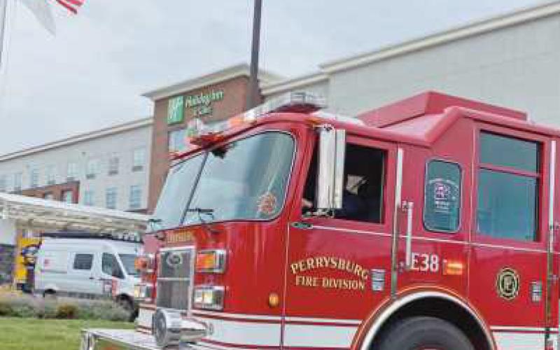 The Perrysburg Fire Division and police department escorted the group out of the city.