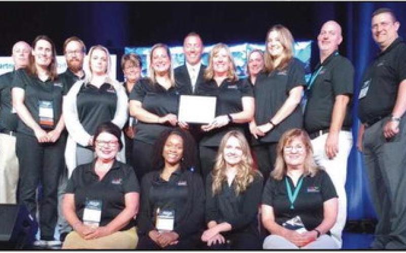 Penta staff and faculty celebrate their third Pacesetter School award.