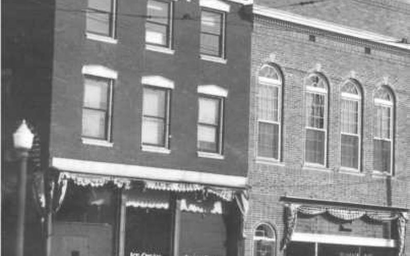 Above left, this historical photo shows 101 and 103 Louisiana Avenue, about 1920. Above right, 103 Louisiana Avenue is now Ragazza Boutique. This photo was taken in 1905.