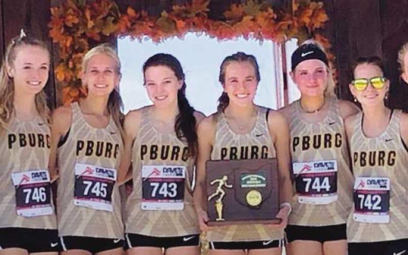Perrysburg High School girls cross country team took home the Division 1 district title with a score of only 19 points. The team finished with Ava Beeks as district champion (first, 18:40), Anna-Sophia Gower (third,19:27), Hannah Kersten (fourth, 19:29), Natalie Sanders (fifth, 19:36), and Sage Colon (sixth, 19:40). Team members are, from left: Holly Dalton, Taylor Moody, Hannah Kersten, Sydney Daudlin, Ava Beeks, AnnaSophia Gower, Sage Colon and Natalie Sanders.