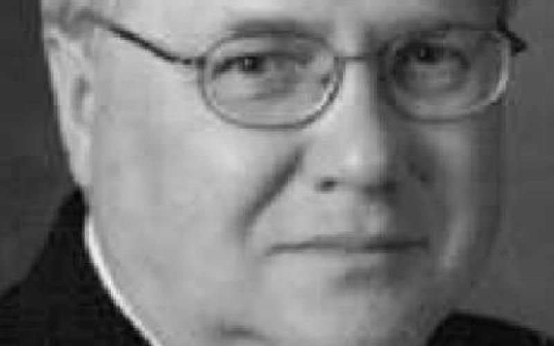 JAMES E. PODIAK