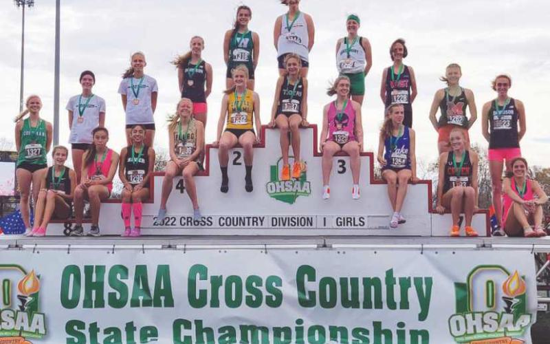 Perrysburg High School sophomore Natalie Sanders received the honor of sitting on the podium with her 14th overall finish at the 2022 OHSAA Division 1 Girls Cross Country Championship. Sanders completed the five kilometer race in 18 minutes 40.3 seconds.