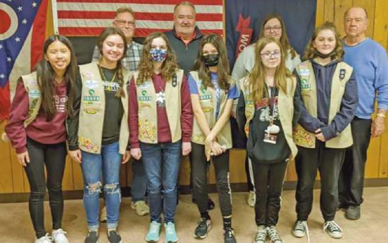Front row are members of Girl Scout Troop 10020, and back row–Trustees Gary Britten and Joe Schaller, fiscal officer Hannah Nelson and recreation director Bob Warnimont. The scouts delivered cookies as an expression of gratitude to township officials for allowing them to use the facilities for delivery and distribution of cookies for the annual sale.