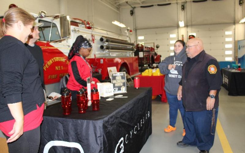 Perrysburg Twp. public safety departments host open house, recognize resident Doug Pratt for his dedication to the township