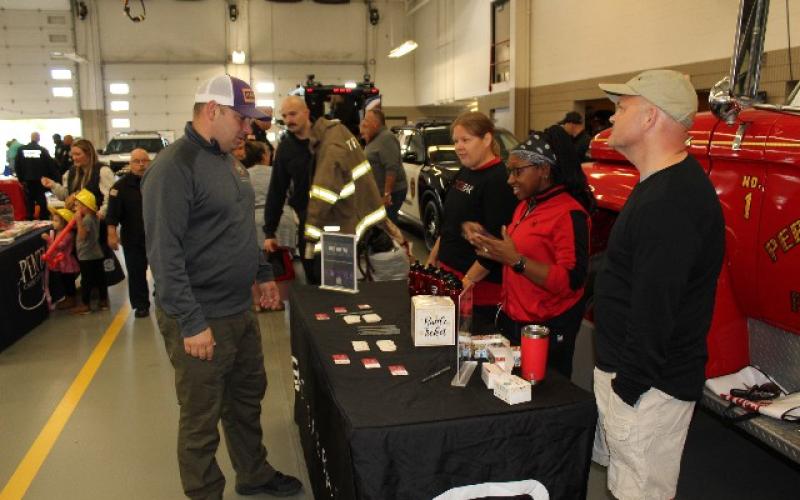 Perrysburg Twp. public safety departments host open house, recognize resident Doug Pratt for his dedication to the township